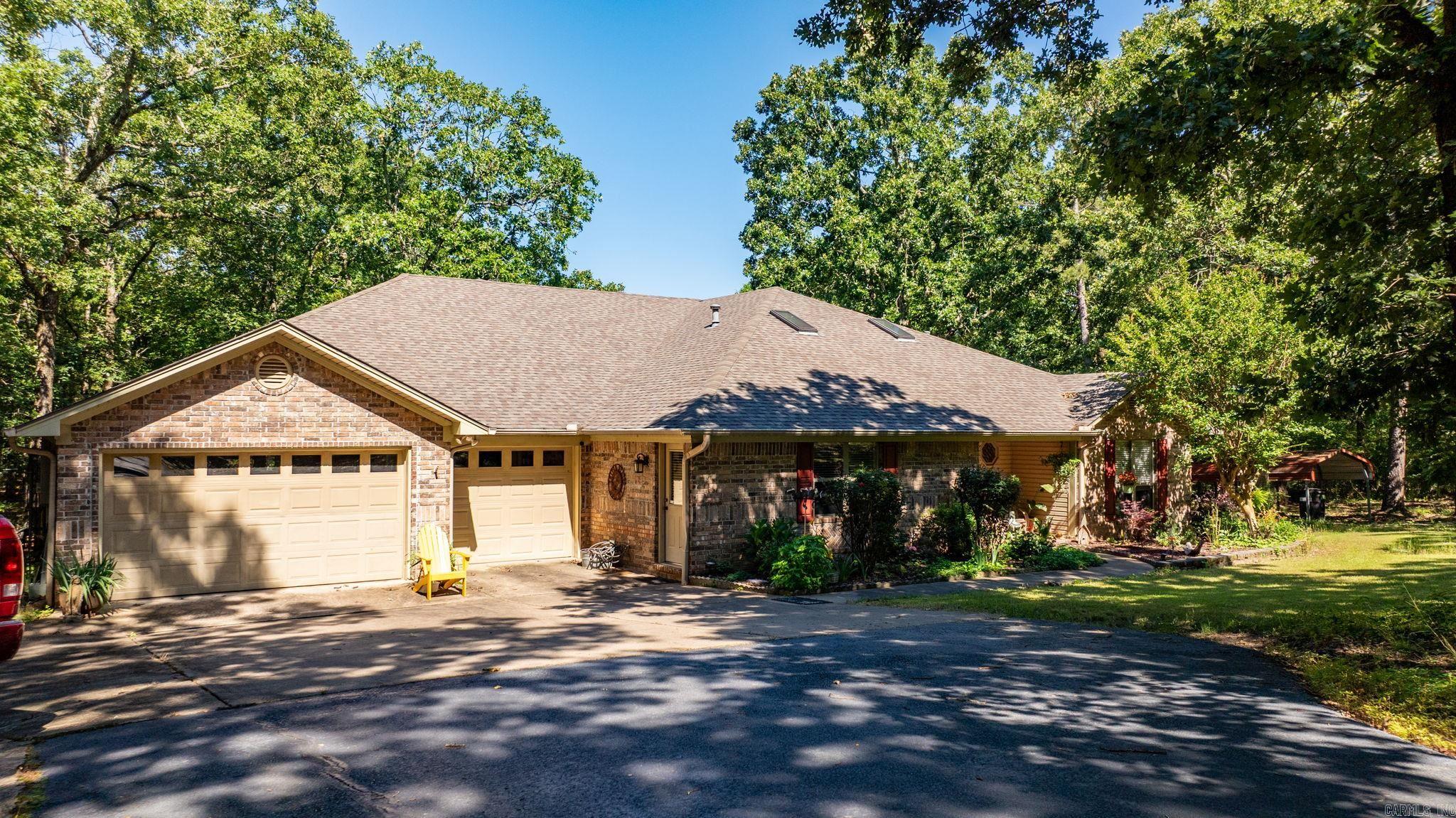 Welcome to your new home just 10 minutes from downtown Conway, where convenience meets tranquility! Nestled on 2.25 acres with privacy, this spacious 2,240 sq ft residence offers the perfect blend of modern comfort and serene country living. With three generously sized bedrooms, 2 1/2 bathrooms, and a versatile bonus room, there's plenty of space for family and guests. The oversized garage ensures ample parking and storage, while the hot tub on the back covered patio provides the perfect spot for relaxation and entertaining. Additionally, enjoy peace of mind with a whole house generator, ensuring comfort and functionality during any weather. Schedule your showing today!