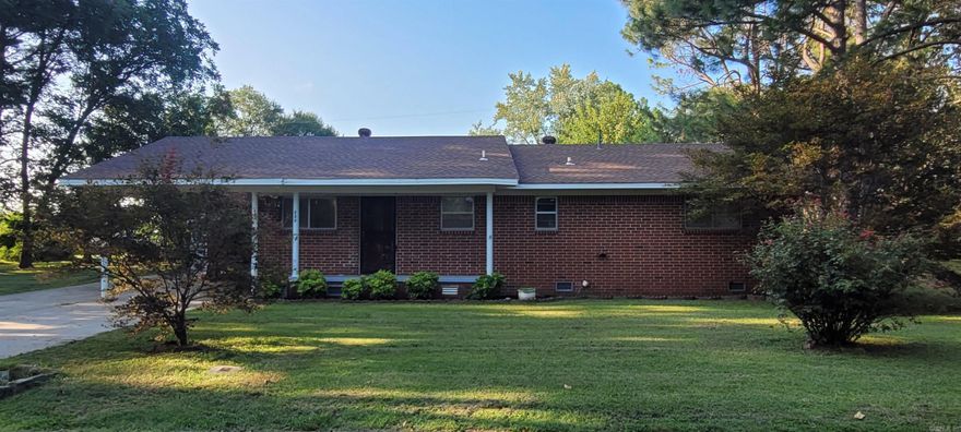 Welcome 222 Cain Drive to market! NEW ROOF, HVAC, AND WATER HEATER 2023! This lovely 3 bedroom, 1 bath brick home has a chain link fenced back yard, storage building with electricity and nice landscaping. There is covered parking for one car with adjacent concrete pad that provides additional vehicle parking space. The home sits on 2 city lots in a quiet neighborhood. The dining area has room for a large table with extra seating nearby at the cozy breakfast bar. Laminate wood flooring is throughout the main areas of the home in the kitchen, dining, living room and hallway and new carpet has been installed in the front bedroom. Just off of the spacious living area is a space that is perfect for a home office, playroom, or could be utilized for lots of convenient storage.