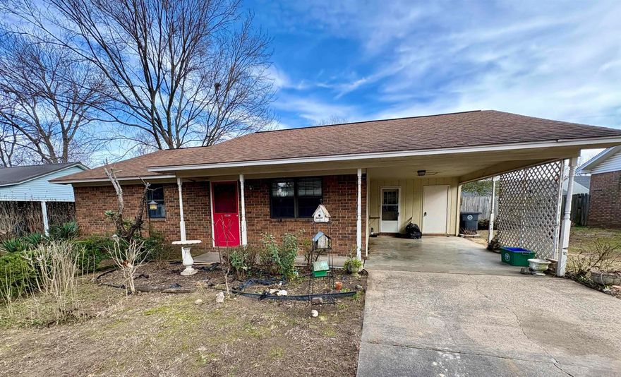 Cute and well-maintained brick home with a fenced back yard a few blocks from Searcy High School. New flooring, abundant flower beds and trees, storage shed and covered parking. Walk-in shower, nearly new stove and water line already in place for a fridge with icemaker. All-electric for energy efficiency and only two owners since it was built in the 1980s. See Agent Remarks.