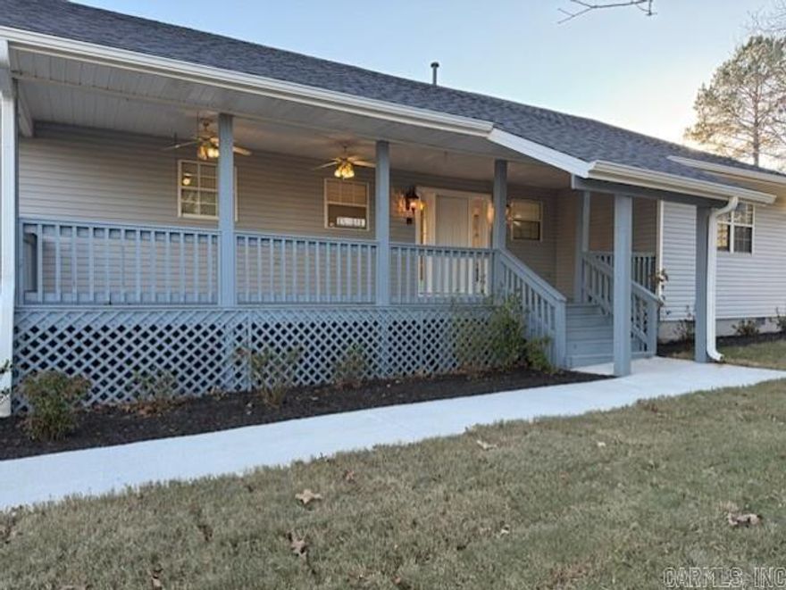 Enjoy your own private piece of paradise on this 5.81 acre farmhouse estate, located just 5 minutes from Maumelle, offering the perfect blend of city convenience and peaceful country living. A gated entrance leads to the private 3,551 sq ft home, recently enhanced with fresh landscaping, decorative boulder-lined bark beds, and planted gardens. A charming pathway leads to the expansive covered veranda, perfect for relaxing while enjoying birds, butterflies, and the beauty of nature. The large, level backyard is ideal for outdoor games, gatherings, and family reunions, while the new ~800 sq. ft. deck overlooks the yard and offers additional space for entertaining. This two-story home features a kitchen on each level, plus a new roof and updated mechanicals. Additional highlights include a large workshop, yard tool storage, FEMA-rated safe room, and hidden vault for valuables. The fourth bedroom offers flexible use as a office or bonus space. Enjoy privacy, space, and peaceful acreage living just minutes from town.