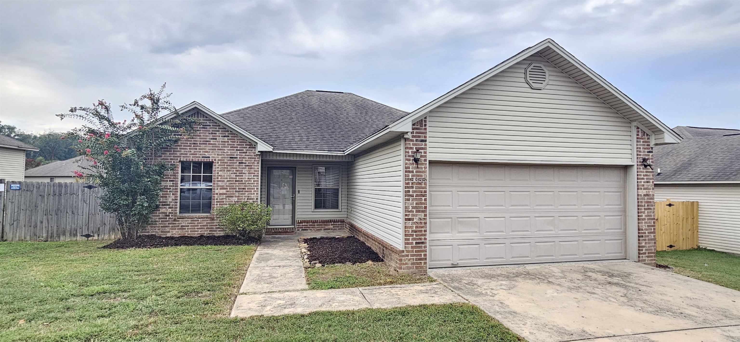Newer All Electric NON Smoking 3 BR/2 BA home in Bryant schools. Kitchen is furnished with stainless steel appliances including fridge, stove, dishwasher, and microwave. Hardwood floors in living room with carpet in bedrooms. Also included are blinds, ceiling fans, walkin closet, washer and dryer connections off the kitchen, separate dining area, patio, fenced back yard, and 2 car garage. Pets may be considered.