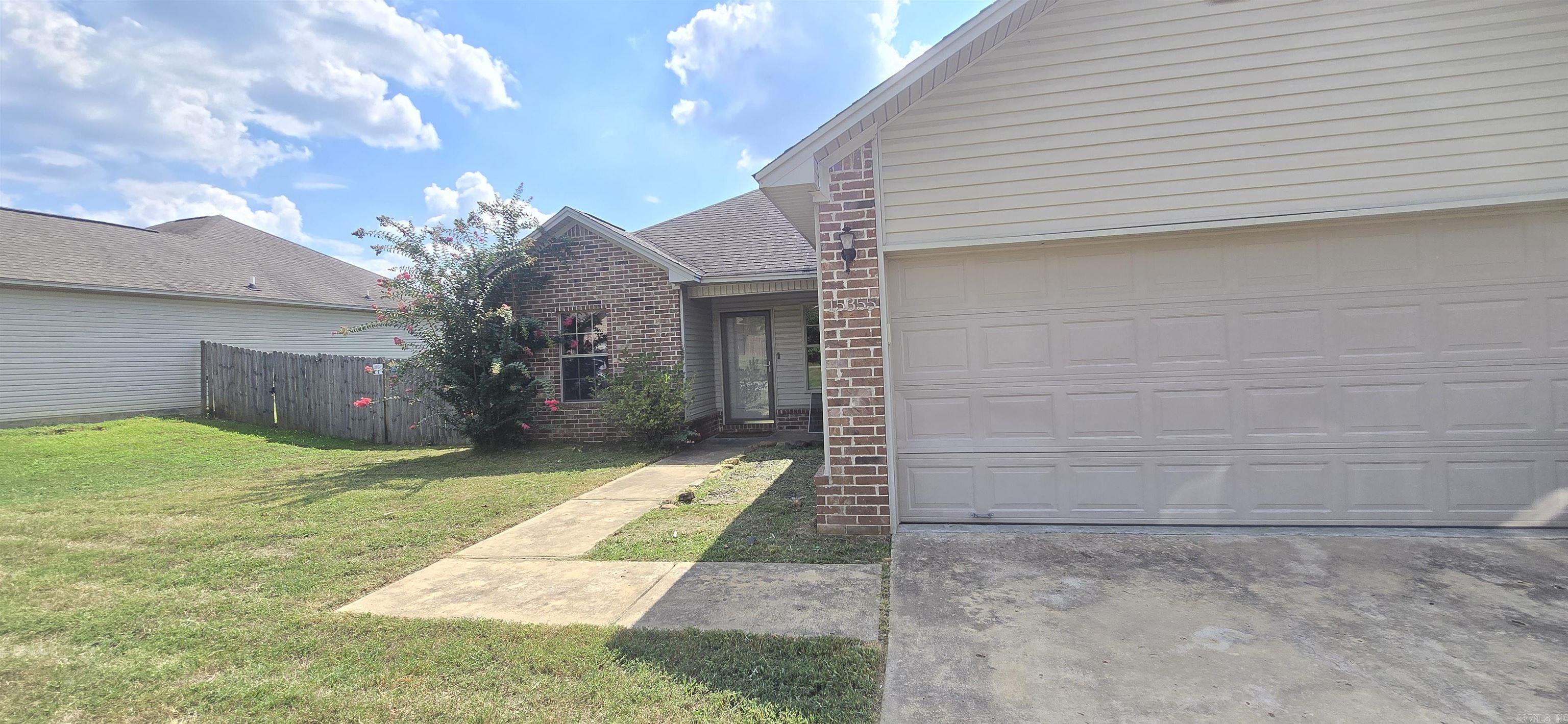 Newer All Electric NON Smoking 3 BR/2 BA home in Bryant schools. Kitchen is furnished with stainless steel appliances including fridge, stove, dishwasher, and microwave. Hardwood floors in living room with carpet in bedrooms. Also included are blinds, ceiling fans, walkin closet, washer and dryer connections off the kitchen, separate dining area, patio, fenced back yard, and 2 car garage. Pets may be considered.