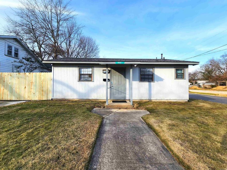 Investors and Business Owners take a look! This versatile, multi-use commercial property enjoys a prime location on a corner lot on West Main St. With great visibility near the downtown business community, parking, and move-in ready condition- this space can be transformed for many uses. It would be ideal for retail, small business, or could become a beauty shop again.   This building had a complete renovation in 2021- including interior and exterior painting, a new roof, new LVP flooring, and a new hvac unit. 2025 improvements include minor electrical upgrades and a new survey. A privacy fence on two sides of the property has just been completed in January of 2026.