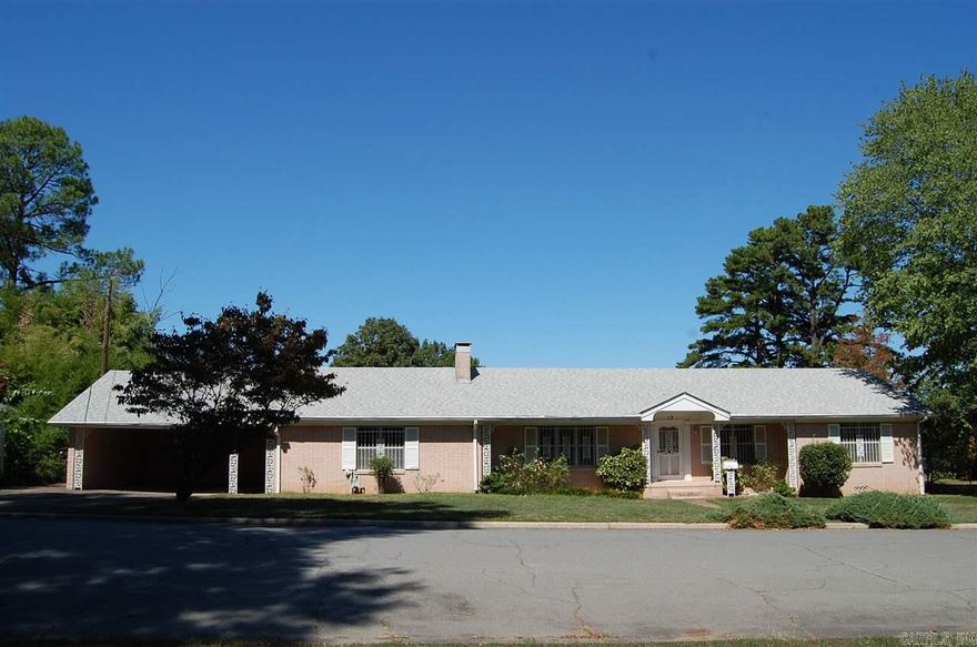 Solid all brick, one-level home on 3 gorgeous lots with newer architectural shingle roof, new carpet in huge front living room, new dishwasher & original hardwoods in second living area/dining room. Abundance of built in bookshelves, fireplace, large laundry room, double pantries in kitchen, 2 car carport w/enclosed storage room & plenty of other storage throughout home. Gorgeous views from private back patio w/endless possibilities in backyard. *Agents see Confidential remarks.