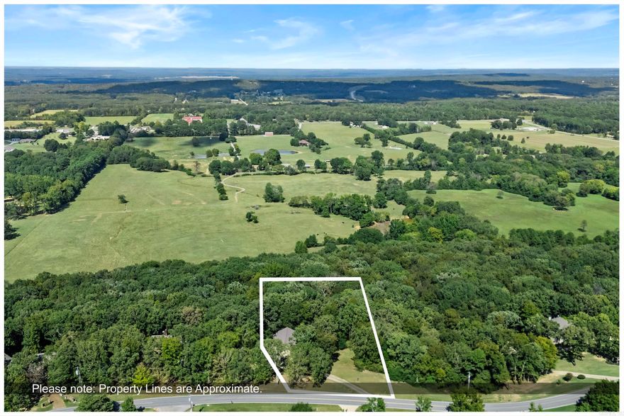 Beautifully remodeled and move-in ready 2-story home on 1.7 acres just off West Country Club Road, within close distance to the Searcy Country Club! Primary suite with full bathroom downstairs plus 3 large bedrooms and 2 full baths up, including a 2nd primary with private deck.  Granite countertops, stainless appliances, oversized 2-car garage with great storage, and a spacious laundry/mudroom that could serve as office space. Two bedrooms upstairs can share bathroom separated by sliding shelf & mirror. . Plenty of room to add a garbage or shop! Agents see remarks.