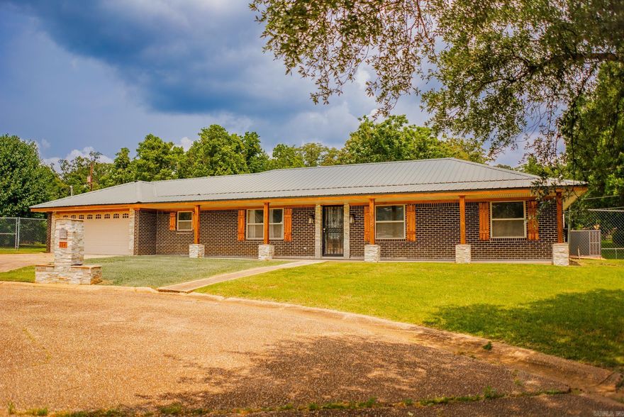 Set on a quiet circle, this 1,871 sq ft single-level home offers a smart layout and solid updates throughout. With a new HVAC system (2021), metal roof, and water heater (2020), the essentials are already covered.  Hard surface flooring flows throughout the home, complemented by updated kitchen, bathrooms and a generously sized laundry room with ample storage and workspace.  A large covered back porch with a built-in grill overlooks the fenced yard—perfect for weekday wind-downs and casual cookouts. Ready to see it in person? Reach out for more details or a private tour.