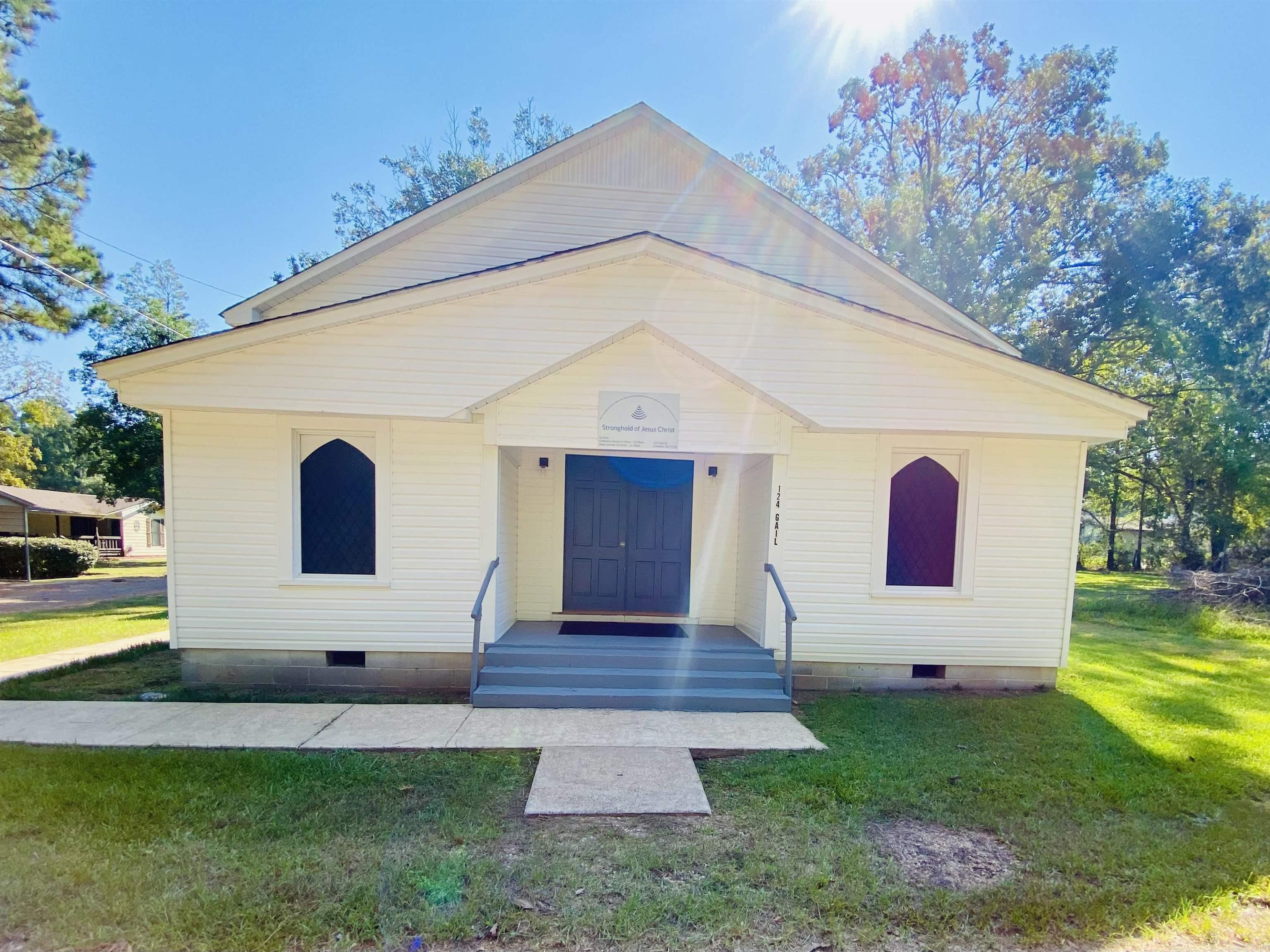 Charming historic church for sale! Step back in time with this beautifully remodeled white church, filled with warmth & character. Nestled on a corner lot, this small traditional sanctuary features original wooden pews, nostalgic stained-glass windows, & a welcoming fellowship hall. Two Sunday school rooms with a baptistry make it fully functional & ready for worship. The entire property has been lovingly updated while preserving its timeless charm. You’ll feel the sweet spirit from the moment you walk through the doors – a perfect home for a new congregation or ministry seeking a place of peace & purpose. *New roof, flooring, baptismal, plumbing, gas line, updated bathroom, fresh paint, & on-demand hot water heater.
