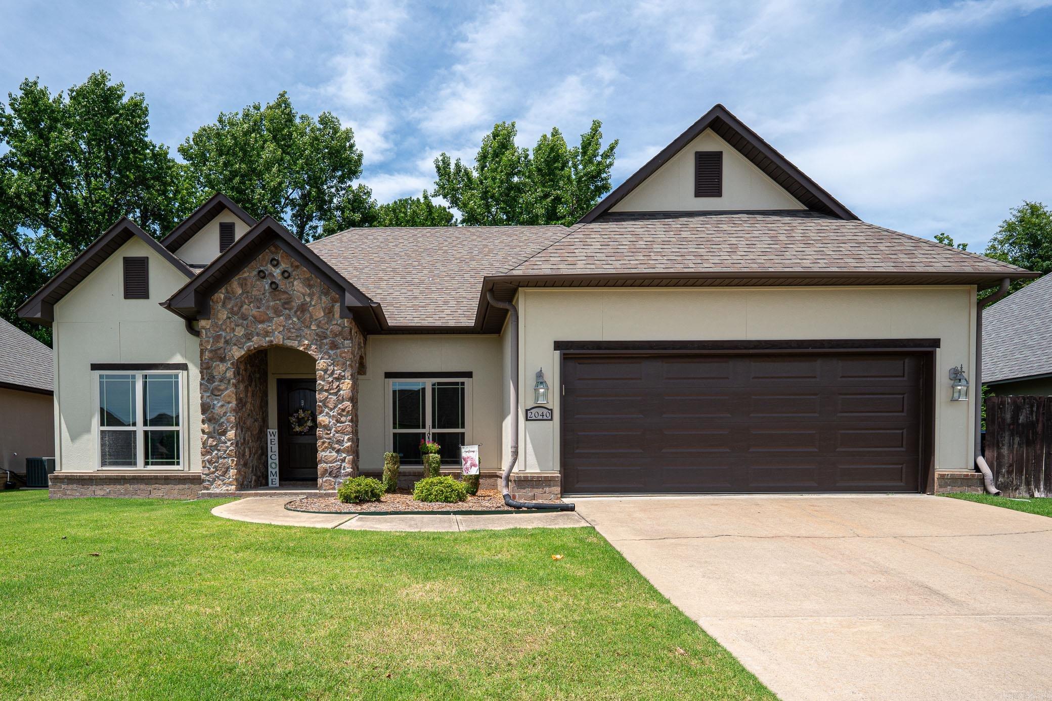 Beautiful 3-bedroom, 2-bath home w/office space in The Gardens at Southridge subdivision. This home features an open-concept layout with new luxury vinyl flooring.Ā The living area flows into the dining space and kitchen. The kitchen features stainless steel appliances, center island w/seating & separate walk-in pantry w/great storage. The primary suite is spacious & includes a large walk-in closet. Primary bath has double sinks, new walk-in shower, new tile flooring & plenty of storage space. Two additional guest bedrooms share a hall bath & the front office provides a great space for working from home or other needs. Additional features include laundry room, two-car garage, nice landscaping, & covered back porch w/private backyard.