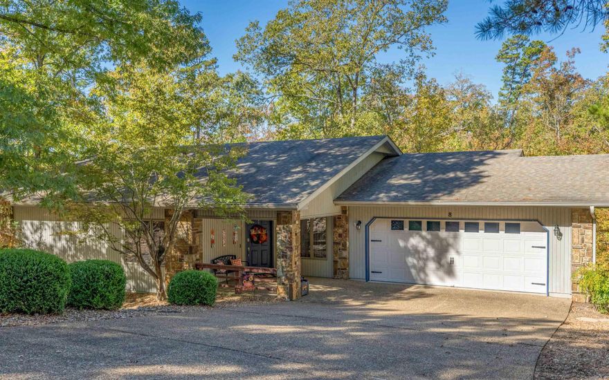 Lake Balboa 10 min drive. Updated home, East side of village sitting on .35 Acres, most secluded lot in the neighborhood.  3 Brm 2 bathrms Cooper Built Home, Madrid Split Floor-Plan, beautiful stone fireplace. Large wood deck for entertaining. Approximately 220 sq ft Arkansas Rm no Heat/Ac in this Rm. Beautiful views of the forest. Fresh paint throughout, newly installed vinyl plank flooring, upgraded fixtures, secondary bathroom remodel with newly installed Carrera marble vanity, porcelain under-mount sink, new shower, lighted faucet. Primary bath has newly installed granite, porcelain under mount sink, lighted faucet fixtures. Kitchen has newly installed granite countertops, breakfast bar, subway tile backsplash, newly installed 60/40 split undermount stainless steel sink, induction cooktop & convection oven.  Hot Springs Village has spectacular scenery located in the foothills of the Ouachita mountains. A 26,000 acre gated community with 11 recreational lakes,  9 golf courses, fitness facilities, library, 30 miles of walking trails, several restaurants, tennis & pickleball. $2,000 Buy-in Fee due at closing. Owner is licensed AR & TX Realtor®