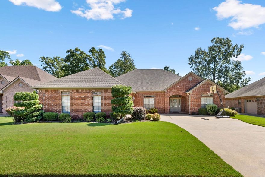 Welcome to 204 Marseille Dr. located on the 16th fairway of the beautiful Country Club of Arkansas golf course! This one-owner home has been freshly painted throughout, and the spacious kitchen has been newly updated with beautiful Quartz Countertops and a gorgeous backsplash! This very spacious home is 3156 square feet, with 5 bedrooms and 3 bathrooms! There is an upstairs bonus room with a closet and a full bathroom that could be an extra primary suite or would make an awesome theater/game room! Separate formal dining room, large laundry room with sink that has new Quartz countertop also! There is Crown Moulding and tray ceilings throughout, and a 2-sided fireplace in the living room that opens to the huge outside wooden deck! You will love the beautiful views! Schedule an appointment today to come see this beautiful home!