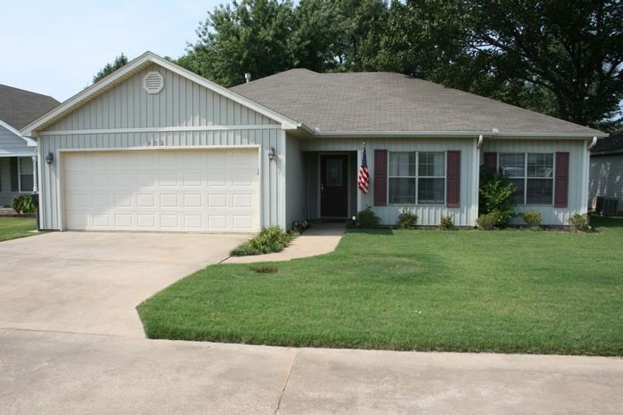 This is a charming home. The inviting family room features a gas log fireplace, a tray ceiling and plush neutral carpeting. The family room opens to the eat-in kitchen which has ceramic tile flooring, a breakfast bar and wood cabinetry. The relaxing master suite boasts a walk-in closet and a jetted tub. Additional amenities of this home include a two car garage, outdoor storage, a wood privacy fenced backyard and a patio.
