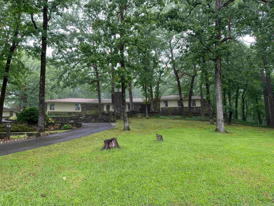 WHAT A HOUSE!CUSTOM BUILT HOME ON 2 ACRES, HUGH SHOP 2 STORY,FORMAL LIVING,FORMAL DINING,GREAT ROOM WITH ROCK FIREPLACE. WONDERFUL KITCHEN.5 BEDROOMS, 2.5 BATHS, HANDICAP BATH,2 HOT WATER TANKS,FISH POND,PULL OUTS IN KITCHEN, CORIAN TOPS IN KITCHEN,VERY NICE LANDSCAPING FRONT DOOR WAS HAND MADE.ALOT OF BUILT INS AGENTS SEE REMARKS