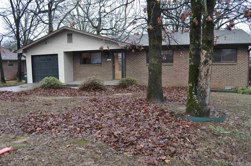 Sherwood home with 2 living areas.  Large den with fireplace and hardwood floors.  Deck on back overlooking fenced backyard.  With just a little TLC, would make a great home!  Some updates have been done;  backsplash in kitchen, tile in bathroom, pedestal sink.    Priced to sell quickly!