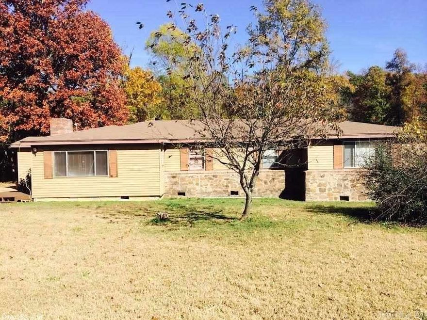 Beautiful acreage in great location in West Pulaski County.  This 5 Bedroom / 3 Bath home was built in 1962 and has 1900 square feet and nice hardwood flooring.  Great family home with plenty of room to roam outdoors.  Big, beautiful trees with Fletcher creek flowing through the back portion of the property.