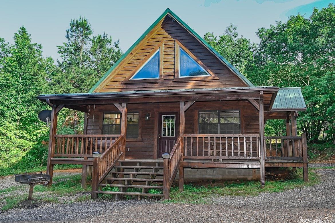 Incredible Investment Opportunity! 7 Cabins on 32+ Acres Bordering National Forest in the Heart of Wolf Pen Gap, Mena, AR Seize this once-in-a-lifetime chance to own a fully established short-term rental business in the rapidly growing vacation hotspot of Mena, Arkansas. Situated in the breathtaking Ouachita Mountains & surrounded by approx 1.8 million acres of pristine national forest, this property offers unparalleled access to outdoor adventures including world-class ATV/UTV trails, rivers, creeks & more.What sets this property apart? *7 fully operational cabins on 32+/- acres, each providing seclusion &tranquility.* Prime location Minutes to town & in the desirable Wolf pen Gap area! We are a fast-growing vacation destination! * Endless outdoor recreation opportunities right at your doorstep.* Room for expansion: Plenty of space to build additional cabins or create your dream retreat. This property is not just an investment, but a versatile income-generating venture. With its stunning mountain views & easy access to outdoor attractions, itās the perfect setting for:* Corporate retreats: A peaceful escape for business teams looking to unwind/bond.* Wedding venues: * serene