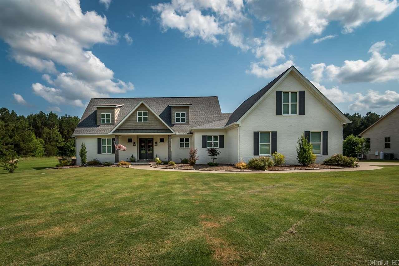 Beautiful family home sitting on 2.49 acres, main house is 4 bed/3.5 bath, 4300+ sq ft, 2 living spaces; also included on property is a 2,400 sq ft barn, half housing a 3 bed/1 bath apartment, and half is shop/storage. Luxury farmhouse finishes, and a generous bonus room! Just minutes from all of WLR amenities, with stunning acreage and peaceful living. Just 1 mile to Pinnacle Mtn, and 1 mile to Rattlesnake Ridge. Wired for generator. Come see this home soon! Agents, see remarks!
