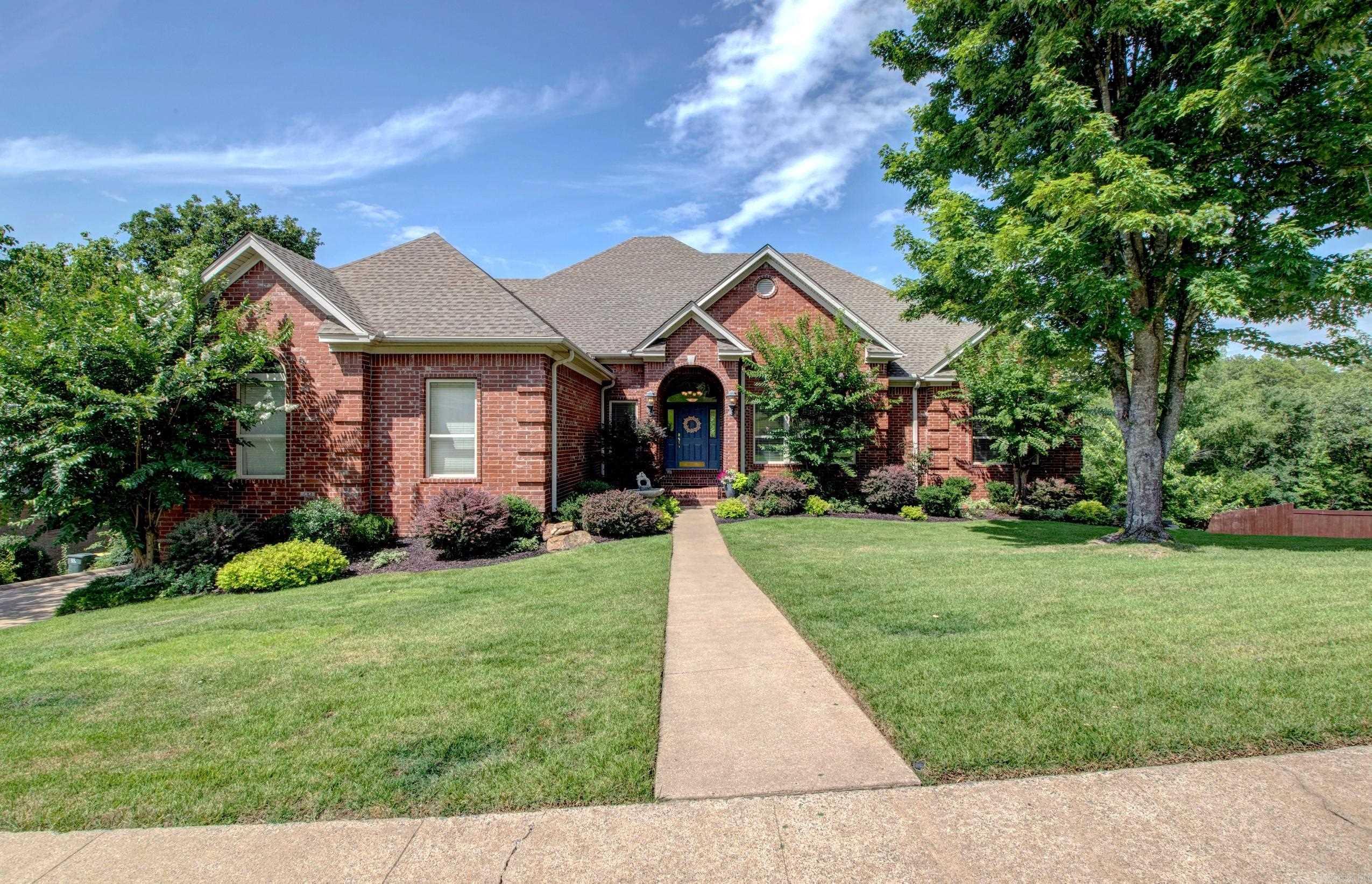 Lovely Custom Built Home Situated In The Highly Desirable WLR Neighborhood - The Ranch. This 4 BR/3.5 BA offers a formal living room, dining room, eat-in kitchen, powder room, large den with fireplace and tons of natural sunlight from the energy efficient windows. Large open kitchen features new stainless steal appliances, new stainless steel sink with Kohler faucet, tons of cabinet space and a large breakfast bar. Master bedroom/bath offers a sitting area, fireplace, deck entry, walk-in shower, jetted tub and walk-in closets. Jack & Jill Bath setup between bedrooms 2 and 3. Upstairs offers a large bedroom with closet, study area and full bath. Downstairs is a large shop area that can be finished out. Additional home improvements include fresh paint throughout, new carpet on the main level, new air handler for upstairs unit, encapsulated crawl space with commercial grade dehumidifier, new LED lighting and a new roof in 2021. The Ranch offers residents a variety of amenities, including a nature preserve, playground, and a private boat ramp. With so many exceptional features and details, a showing is the best way to truly appreciate all this home has to offer! Come see!
