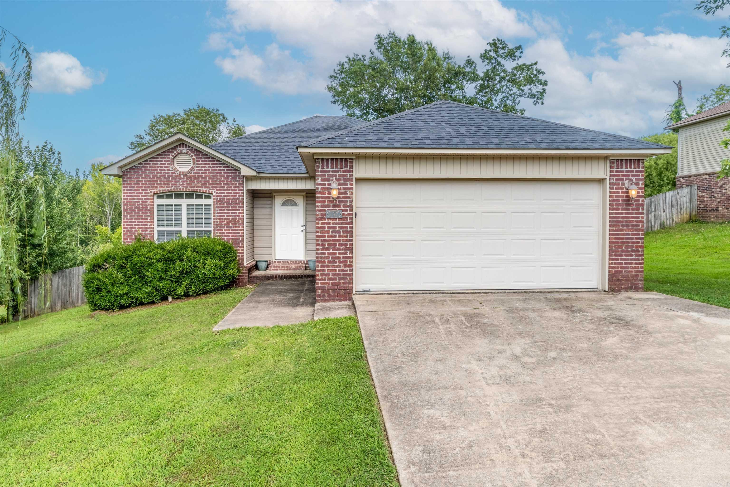 Welcome to this beautifully maintained 3-bedroom, 2-bath home located in a quiet neighborhood just outside the city limits of Cabot, within the sought-after Cabot School District. This home features a split floor plan, spacious living area with vaulted ceilings, and plenty of natural light. The kitchen offers ample cabinet space and a cozy dining area perfect for family meals. The primary suite includes a walk-in closet and private bath with double vanities. Enjoy the large, fully fenced backyardāideal for pets, kids, or entertaining. With a 2-car garage, covered patio, and a peaceful setting on a 0.30-acre lot, this home has everything you need. Qualifies for RD (zero down) financing!