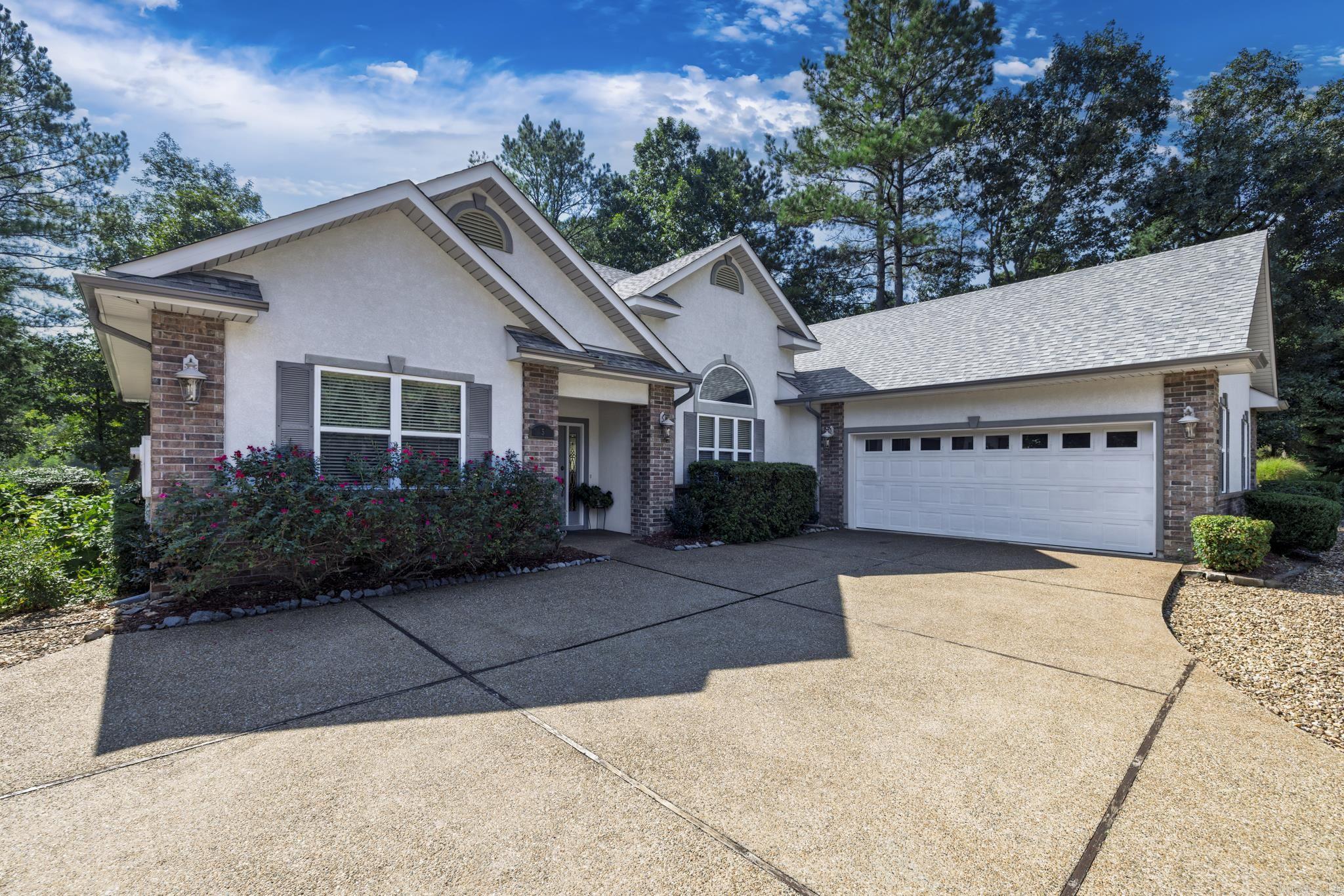 Have you been looking for a one owner, lovingly maintained home on a golf course? Then this is the one for you. This home features vaulted living room ceiling, gas log fireplace surrounded by shelving, full wall of windows overlooking Nina 6 of popular Isabella course. Composit deck across the entire back of the home. Large formal dining room. Kitchen has granite counters, ceramic back splash, pull out drawers, breakfast nook overlooking course and much more. Very large primary suite with large walk in closet and bath with shower, jetted tub and separate vanities. Guest rooms share large bath and are on other side of the home for privacy. This home has newer heat pump and water heater. The roof was installed in August of 2025. This is a jewel. Hot Springs Village is a 26,000-acre gated community with 11 lakes, 9 golf courses, white sand beach, hiking trails, pickle ball, fitness center, indoor and outdoor pool, tennis and SO MUCH MORE. One-time POA buy-in fee $2000 due at closing. Come to the Village and enjoy the life you deserve.