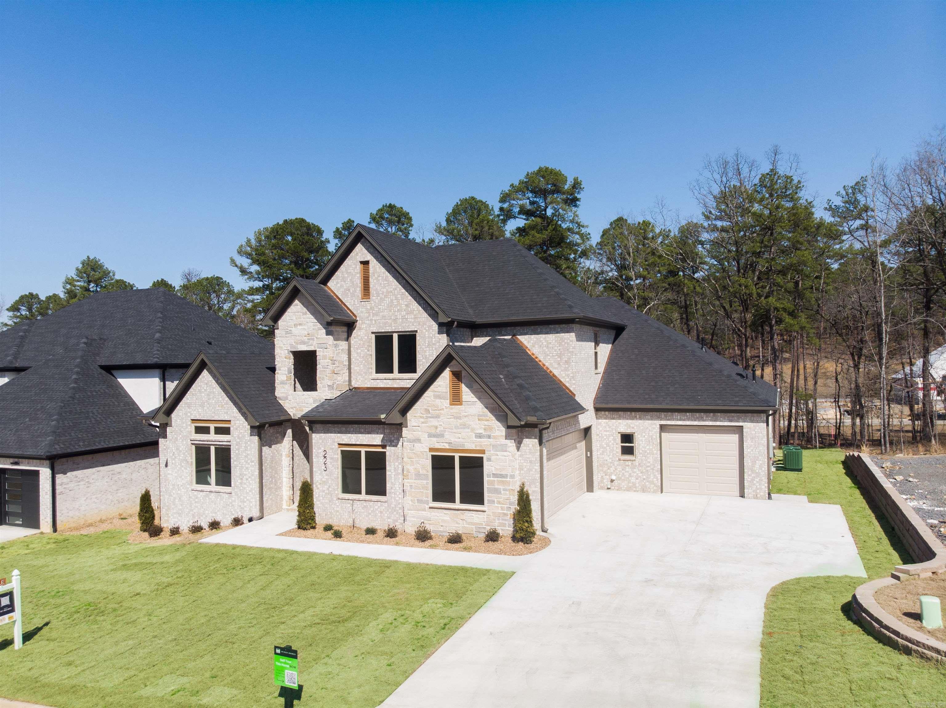 Welcome to 223 Abington — a beautiful new construction home rental in the heart of West Little Rock! This spacious home offers 5 bedrooms, 3.5 bathrooms, and an open-concept layout perfect for comfortable living and entertaining. The kitchen features modern cabinetry, stainless steel appliances, and a large island that flows seamlessly into the dining and living areas. Enjoy fresh paint, updated flooring, and plenty of natural light throughout. The primary suite includes a walk-in closet and en-suite bathroom with double vanities and a separate tub and shower. Step outside to view your private green space by your fireplace — ideal for pets, play, or relaxing evenings. Located on a quiet street just minutes from local parks, trails, shopping, and dining. Pets allowed with owner approval. No smoking. Available Now Security deposit: $12,000 Schedule your showing today and make 223 Abington your next home! You can set up a self guided tour by scheduling on the Hines Homes website.