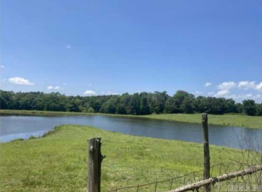 136-acre property featuring approximately 88 acres of pasture and 45 acres of wooded land, along with multiple ponds. A 2,711 square foot home with 4 bedrooms and 3 bathrooms is also located on site and includes a vaulted-ceiling great room with a wood-burning fireplace. Improvements on the property include a 2-bedroom, 1-bath tenant house, several barns, sheds, and eight older breeder houses. The property is being sold as-is.