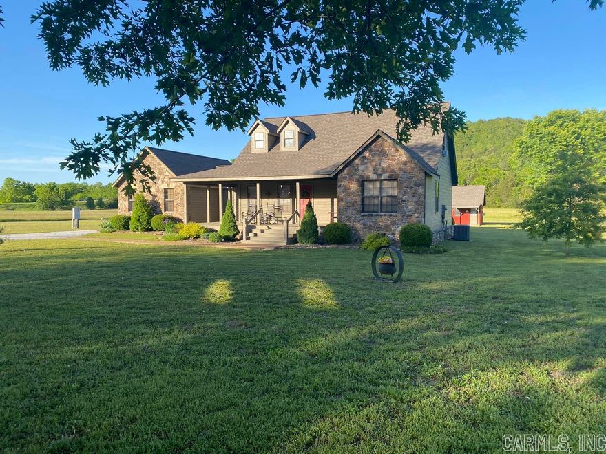 Beautiful home with updates with the White River View.  3 bedrooms and 2.5 baths with downstairs having the Main bedroom/bathroom and a guest bathroom and upstairs having 2 bedrooms and 1 full bath with one bedroom being an open loft. New updates are throughout the home with the roof being replaced in 2020, some of the windows in 2019/2020, CH&A in 2021 and both water heaters being replaced in 2022/2023. Separate garage with an attached studio apartment for guest as needed. Mountain views all around and within 4 miles of downtown Mtn. View and within about 5 miles of Blanchard Springs Caverns and the White River just across the street.