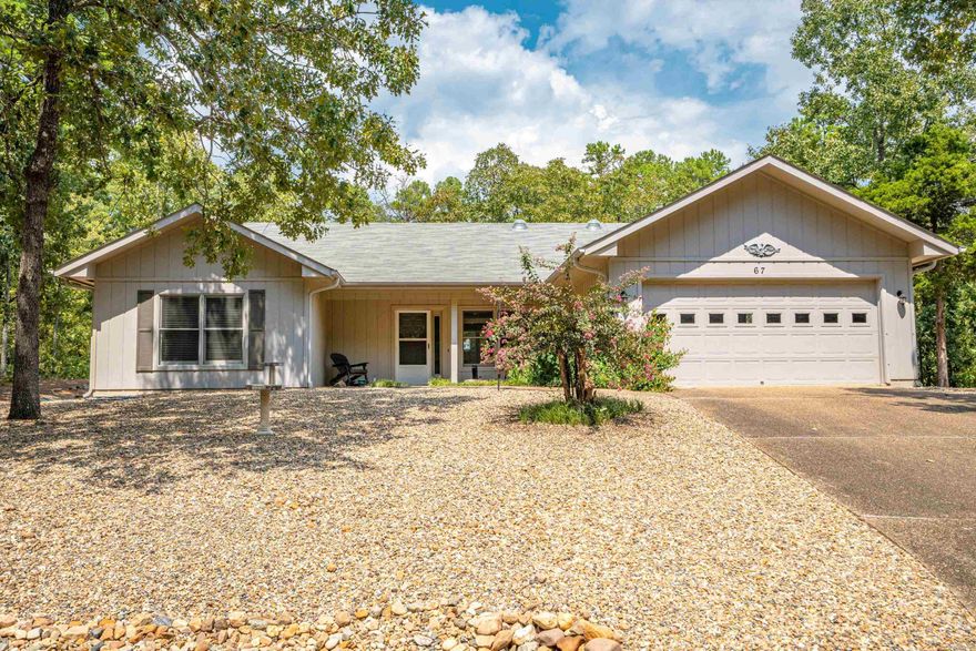 Welcome to this beautifully remodeled home in the heart of Hot Springs Village! Inside, you’ll find granite countertops in the updated kitchen, LVP flooring and a stunning walk-in shower all adding a touch of luxury to everyday living. Step outside to your fenced backyard, ideal for pets, where you can also unwind in the private hot tub that conveys with the property. The storage shed is roomy enough to accommodate a golf cart or yard tools, offering added convenience for active lifestyles.  This one level home combines comfort, style, and practicality in a peaceful, secure community. Don’t miss the opportunity to make it yours!