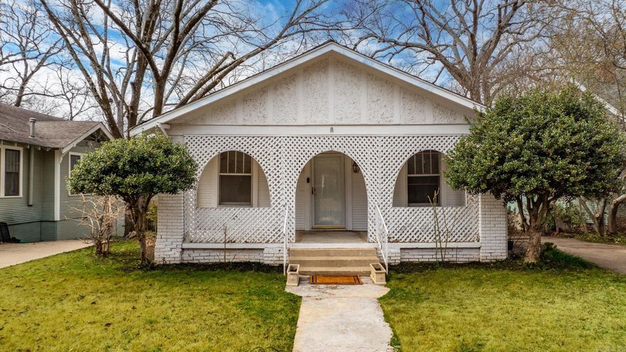Extensively renovated Hillcrest cottage on a highly desirable street, a short walk from local dining, shopping, Kroger and UAMS. Thoughtful upgrades include a new architectural shingle roof, tankless water heater, fresh interior paint, and updated lighting throughout—including newly added recessed lighting in the living room and kitchen. This home beautifully blends historic character with modern comfort. Enjoy the large covered front porch, original hardwood floors, tall ceilings, classic archways, and charming built-ins. Extensive structural improvements have been completed by Foundation Pro, along with updated electrical throughout, offering confidence and peace of mind for years to come. Both bathrooms feature updated tile flooring, while the spacious kitchen offers abundant storage, large pantry, granite countertops, tile backsplash, and tile floors that flow into the laundry area. Step outside to a new deck and newly privacy-fenced, level backyard—ideal for entertaining, pets, or play. A walk-out basement provides generous storage and the potential to finish as a bonus room, office, game room, or workshop. Rear alley access through a double gate adds everyday convenience.
