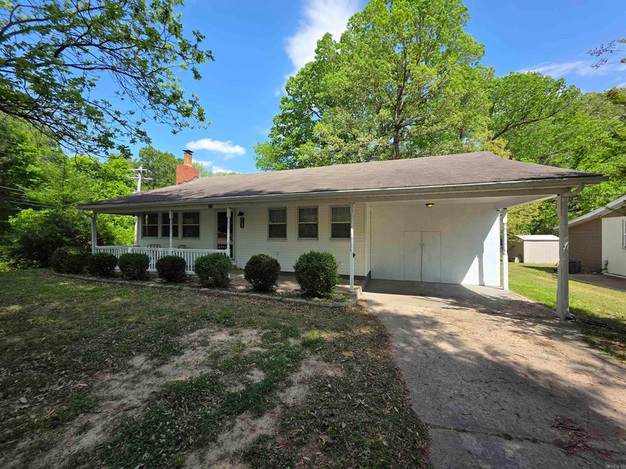 Charming 2-bedroom, 1-bath home with 1,111 sq ft of comfortable, well-designed living space on a spacious 0.29-acre corner lot, ideally positioned at the top of a hill for added privacy. Originally a 3-bedroom, the layout has been thoughtfully opened up but could easily be reconverted for added flexibility. This inviting, move-in ready home features recent updates, including fresh paint throughout most of the home and new bathroom flooring with a rainfall shower. Generously sized bedrooms include a primary suite large enough for a sitting area, along with a walk-in closet. You’ll also find a dedicated utility room, ceiling fans throughout, and ample storage with multiple interior closets, a shed out back, and additional storage in the attached carport. The spacious eat-in kitchen comes equipped with stainless steel appliances, and the washer and dryer are included. Enjoy a fenced backyard with a built-in doggy door, plus a gas fireplace inside that adds warmth and charm.