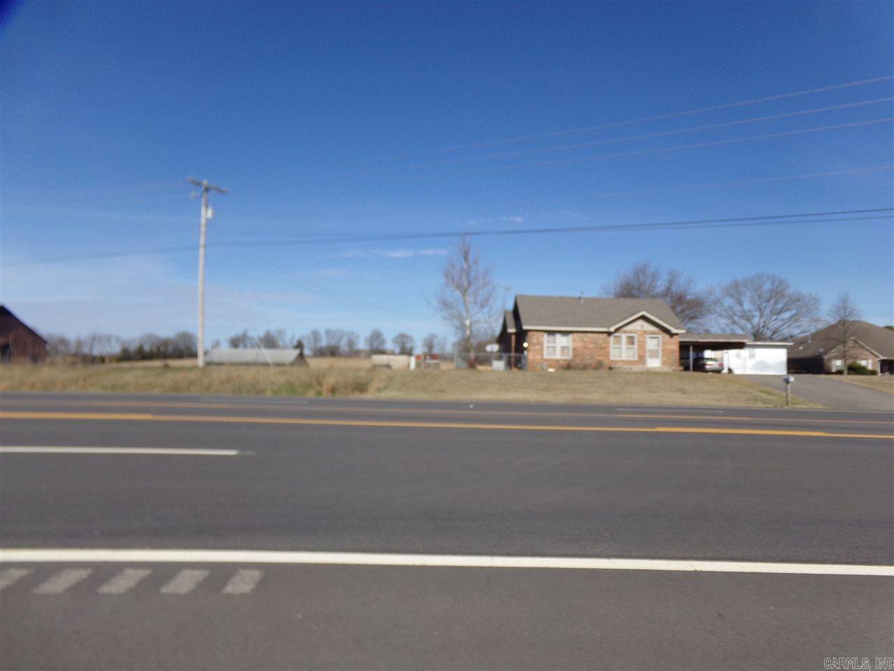 Excellent commercial property in city limits on busy Hwy 64 W. In city limits along Beebe commercial corridor. House, barn, and shop on property listed at "no value". No signage.