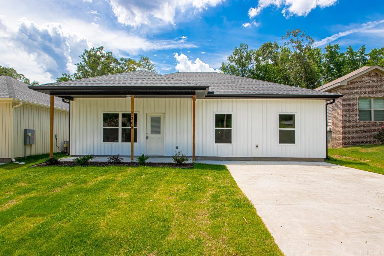 Brand-new 4 bed, 2 bath home in Little Rock! This new construction features durable luxury vinyl plank flooring, granite countertops, white shaker cabinets, and stainless steel appliances. Matte black fixtures add a modern touch throughout. The bathrooms offer sleek finishes with framed mirrors and black hardware. Enjoy the covered front porch, back patio, and freshly sodded yard. Located just minutes from shopping and dining. Hard to find new construction in this areaādon't miss it!