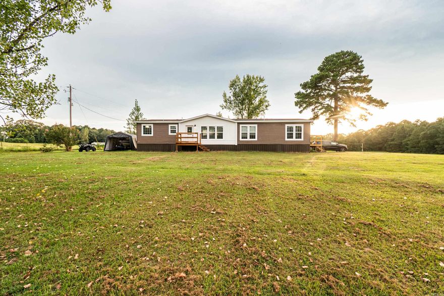 This well-kept home offers you and your family an abundance of space with approx. 5.72 acres to roam! This home is a 2021 Buccaneer, all appliances remain, new porches, washer & dryer remain. Living room furniture can be negotiated.