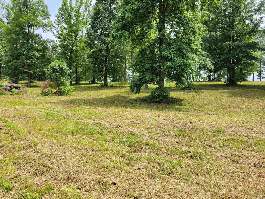 This beautiful lot sits on 3.23 acres just located out of Nashville, beautiful hardwood trees. Area amenities with membership include golf course, and swimming pool.    This lot is located on paved road in a beautiful subdivision.
