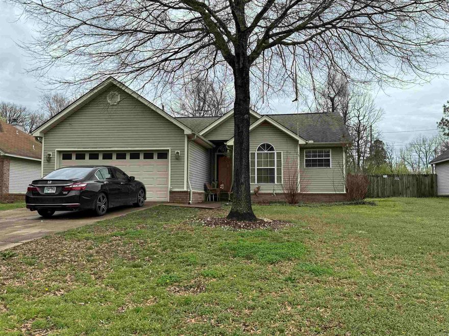 Cute house with split bedroom plan. Nice Vaulted ceiling in living room. Has 3 bedrooms, 2 bath, 2 car garage with floored attic, tiled floor in wet areas, carpet in bedrooms, Roof in 2018. Big outside building Do NOT convey. SOLD AS IS WHERE IS. See Showing Remarks