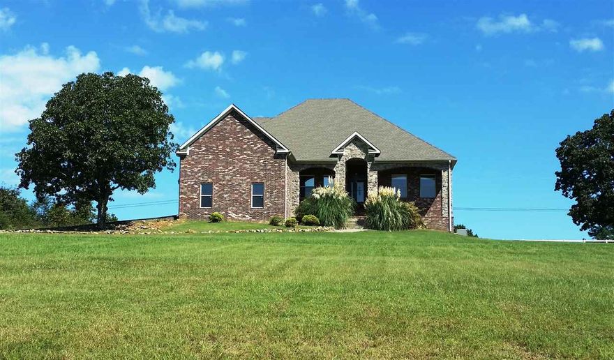 Gorgeous House, 5 bedrooms, 3 1/2 Baths, on 0ne acre, with Spectacular View and Safe Room. Motivated Sellers priced below Appraisal.