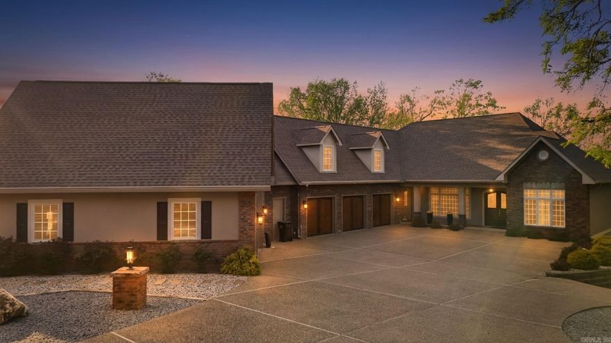 Upon entering, you'll fall in love with breathtaking views & instant WOW. Living room is wrapped in windows overlooking Lake Balboa, flooding home w/natural light, soaring ceilings, remote blinds, transoms, rich hardwoods, & gas fireplace. Kitchen dazzles w/granite countertops, island w/prep sink & second disposal, Electrolux fridge & freezer, walk in pantry, wine bar, pull outs, leaded glass fronts and sunny breakfast nook. Spacious formal dining room. Primary suite features  covered walk-out to expansive Trex deck. Primary has massive bath with jetted tub, multi-head shower and oversized closet connecting to laundry. Guest room on entry level. Upper-level guest suite includes bedroom, bath & living area. Lower level offers 3 bedrooms, full bath, family room, kitchenette, & finished storage. Level lots lead to a huge new dock. Toy/cart storage w/overhead door, workroom, storm shelter & more. Full width deck showcases fireplace, fridge, partial cover, ceiling fans & speakers.  Two in ground geothermal units heat, cool and warm water. 3 car+ garage w/storage. Gym, workshop or office with separate entry, mini-split and attached RV garage. Exceptional Lakefront retreat must be seen!