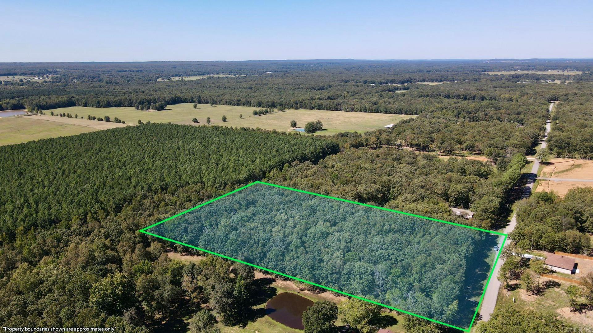 This 5 acre property offers the perfect mix of peace and convenience with paved road frontage. Located just 18 minutes from Cabot and 38 minutes from Little Rock, it's an perfect spot for your future home. The land is level, wooded, and close to Hwy 5, with nice neighboring properties in the area. It's zoned residential, making it great for building or even hunting. Power and rural water are nearby at the main road. Buy now and build later. No restrictions. Priced right and ready for a new owner to enjoy. Check it out