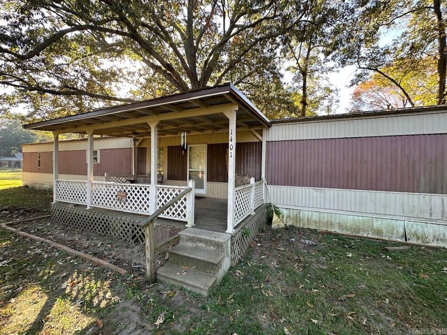 Large 3 bed 2 bath single wide on two lots for sale in Des Arc, AR. Very close to downtown on a quiet well maintained street. This property would make a great home, but would also be an excellent spot to call hunting/fishing camp. Located very close to the White River access in Des Arc and just minutes away Wattensaw, Hurricane, Bayou Meto, Dagmar, and the Cache River Refuge. The mobile home is on city water and city sewer. Property is being sold as is.