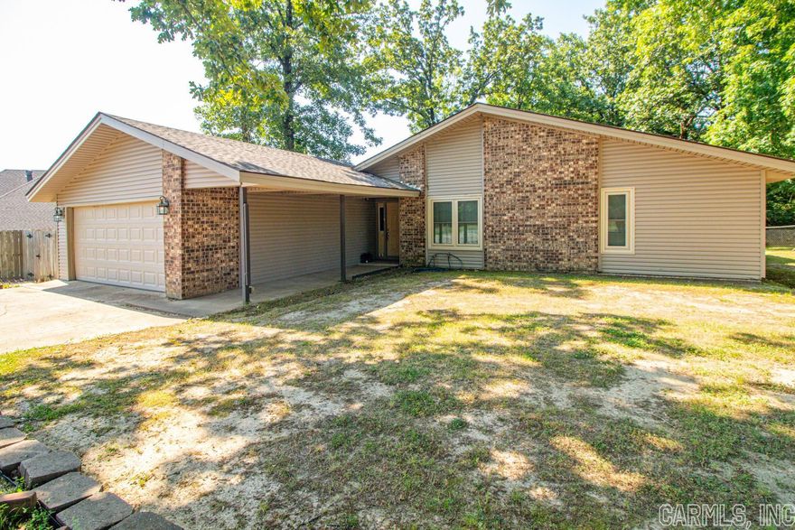New roof and windows, new flooring, new HVAC.  Open concept with huge master bathroom. Great location on quiet .83 acre. Huge shop with electric. All electric home with tankless water heater.