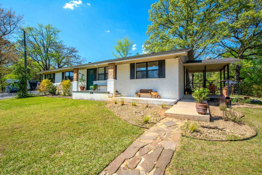 Homestead-ready property on 1.76 acres with space, updates, and functionality. Features include area for chickens, garden sheds, established garden, peach and apple trees, plus multiple berry plants. Enjoy two covered patios for outdoor living and entertaining. The property also offers a large fenced area for animals, a 3-level treehouse, zip line, and rock wall. Inside, the home is updated with a clean, charming feel. Living area features a wood-burning fireplace. Kitchen includes granite countertops and stainless appliances. The primary suite offers a walk-in closet and a tiled walk-in shower with dual shower heads. Loft beds in guest room can remain or be removed based on buyer preference. Set up for expansion, the property is ready for a second dwelling with a separate address, water lines, and an additional 1,000-gallon septic tank already installed. A rare combination of usable land, recreation, and future potential. Agents see remarks for additional details.