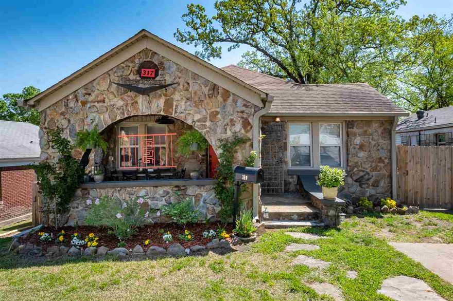 Quarry Cottage. Perfect location just a stone's throw from UAMS. With off-street parking and a fully fenced yard, this gem is highly desirable for in-town living. Beautiful hardwood floors, two lovely remodeled bathrooms, nicely-sized bedrooms, all freshly painted and a new deck. Walk to class, walk to Hillcrest, walk to work. What more do you need?