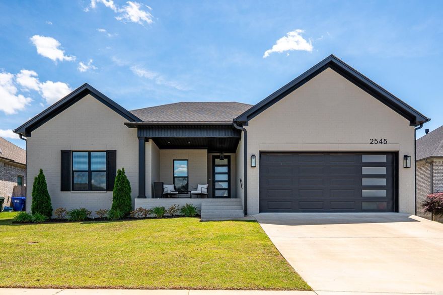 Better than new in Robynmar, where modern design meets everyday functionality! This stunning residence features an oversized kitchen with elegant quartz countertops and custom cabinets, perfect for cooking and entertaining. Enjoy luxurious custom tile showers, spacious walk-in closets, and a relaxing soaker tub. The covered patio and front porch invite you to unwind, while the fully fenced yard ensures your privacy and security. With extras like built-ins, a tankless water heater, and a gas cooktop, this home is truly a must-see!