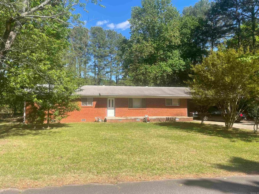 Unique piece of property on 1.64 acres on Conway Corp.  Located at the end of a dead end street just off Hwy 64 (Oak Street), currently zoned R-1. Home has been rented for 17 years. Opportunity to develop the land and use income from rental to offset cost of development. Or get a rehabilitation loan and increase your value through land acquisition. Or any other ideas you can come up with. Unrestricted other than zoning. Sorry, no interior pics available. Has a nice storage building on the property. Lets put a plan together and turn this into a booming investment.