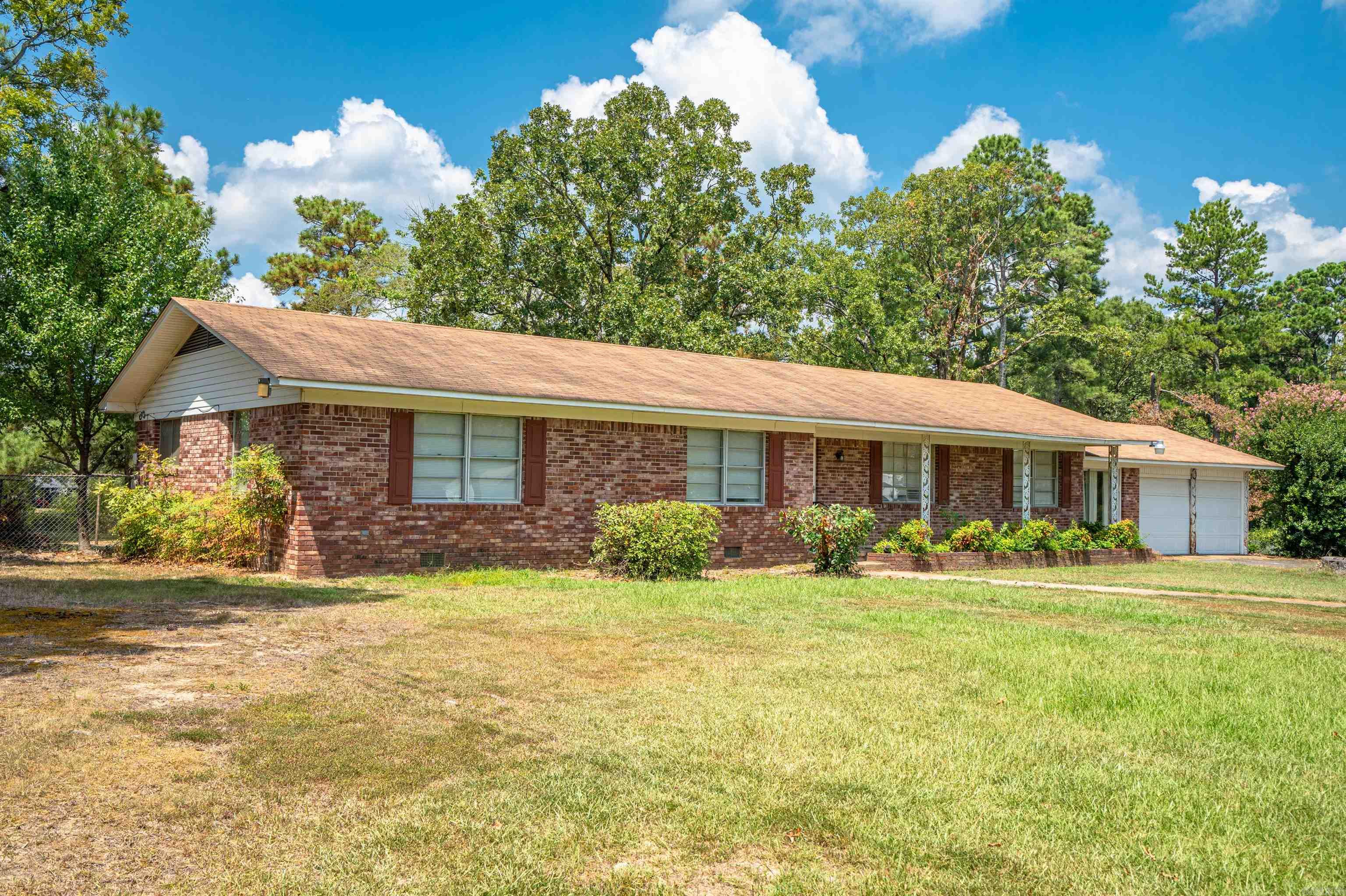 Brick home on 20 acres, located in the heart of Bismarck.