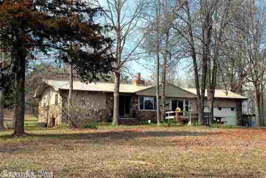 Pastoral 2.5 BR/1BA home on 32 acres with gorgeous view of large pond. Home is tucked away at the end of a winding drive through the woods. Cleared around the house. 2 wells. Dogwoods galore! 2nd add'l pond. Lots of room to garden. Hay barn, multiple outbuildings. 2-car garage. Fruit trees, flowering trees. Fireplace and CH/A. New roof, carpeting, windows, deck. Hunting heaven! So private and peaceful. Perfect for sustainable living or recreating. Short drive to river or lake IF you can bear to leave home!