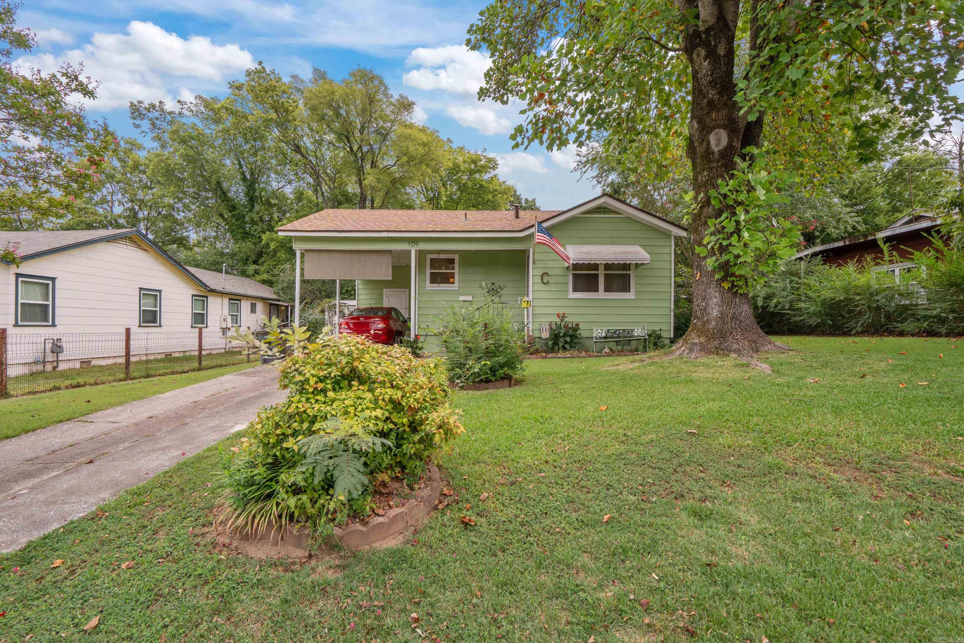 Charming City Retreat! This delightful, well-maintained city home, now on the market for the first time in 25 years, offers a perfect blend of comfort and style. Nestled in a serene neighborhood, the home boasts lush green lawns and a welcoming façade. With mature trees providing ample shade, a cozy front porch ideal for morning coffees, and beautifully landscaped front yard, this property is a rare gem. Inside, discover an inviting layout ready for your personal touch. Conveniently located close to local amenities, this is city living at its best! Don’t miss this opportunity to make it your own.