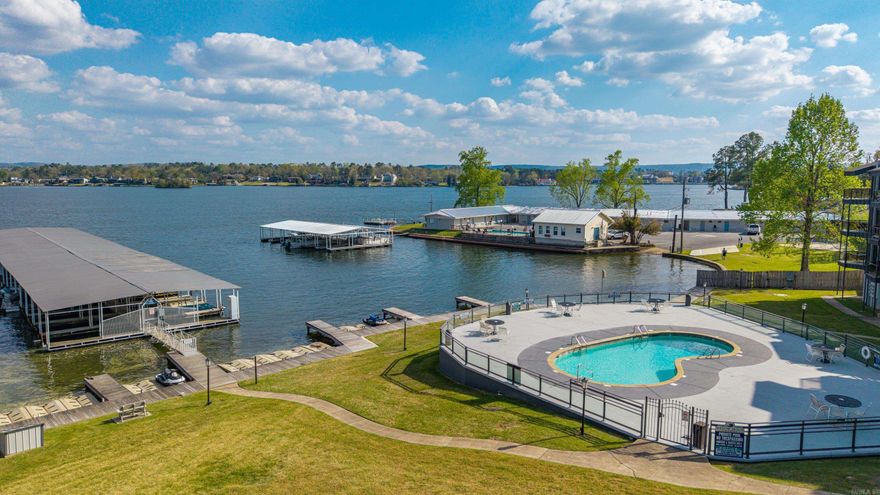 Fully updated and Move-in ready, this beautifully furnished 1 bedroom, 1 bathroom condo on Lake Hamilton offers the Perfect blend of comfort and style. Inside, you’ll find Granite countertops, updated Stainless steel appliances, tiled Walk-in shower and a modern, thoughtfully Designed interior. Enjoy lake living to the Fullest with your own covered boat slip, ideal for weekend getaways or full-time relaxation. This unit comes with a transferable Short term rental license with a Proven track record as a Successful short-term rental, offering an excellent opportunity for both Personal use and Income potential. Whether you’re looking for a Private getaway or an investment, this one checks All the boxes.