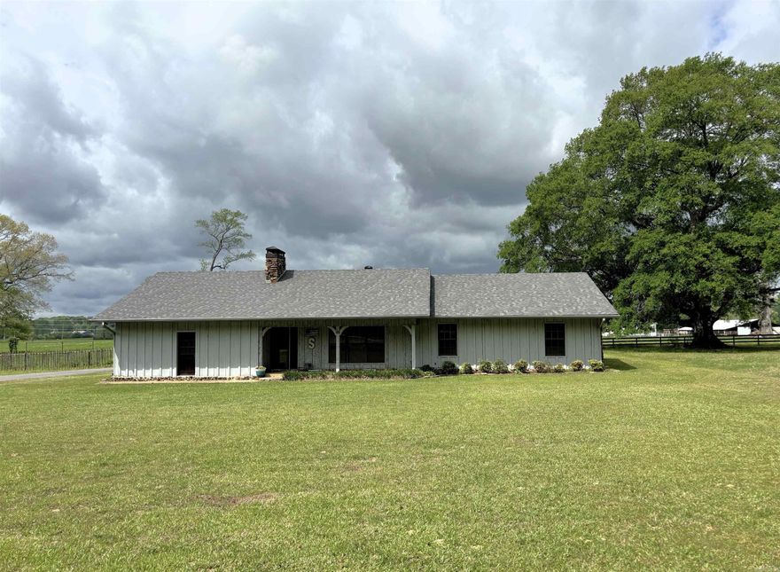 Property Overview Below: Bedrooms/Baths: 3 bedrooms, 2 full baths (flex to convert up to 5 bedrooms) Living Area: Approx. 2,500+ sq ft Location: Edge of town — privacy with quick access to amenities Roofs: House and barn roofs replaced ~1 year ago Interior Highlights: Great Room: Expansive living room with a striking natural rock fireplace Kitchen: Quartz countertops, custom birch cabinetry, abundant workspace Craftsmanship: Heart Cypress wood handpicked by the owner, extensive custom trim Efficiency & Comfort: Extra insulation for sound/privacy and energy performance Flex Spaces: 23' x 22' bonus room plus a separate office—ideal for hobbies, guests, or work-from-home Construction & Structural: Foundation: Extra-wide footings with heavy rebar; walls bolted to slab every few feet for enhanced structural integrity Owner-Built Quality: One-owner home, meticulously maintained Barn: 34' x 30' with an 8' x 30' lean-to Stalls: Four total; two with run-out paddocks. Tack Room: Large, well-organized space This home has an office and huge flex room-perfect for your friends and family.