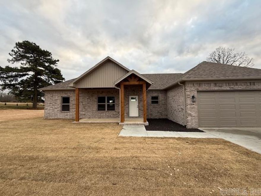 Fantastic new construction home on just under 1 acre. This home has some nice extras: Vaulted ceiling in the living room, attractive vent hood above the stove, electric fireplace, granite countertops, huge pantry, island, laminate vinyl plank flooring throughout and a large laundry room with lots of cabinets. Completion at the end of December.