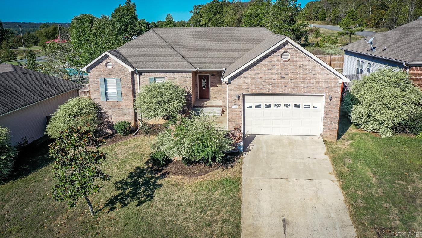 Located in desirable Greystone Golfing Subdivision! Interior freshly painted. All electric. 4 bedrooms. Kitchen has pantry, granite tile countertops, breakfast bar and fridge will convey. Split plan. No carpet. Fence and deck freshly stained. Security system installed, not activated. Area amenities: 2 golf courses, walking/biking paths, clubhouse and restaurant/bar, pool, NEW PCKLEBALL COURTS! (several membership options available.) Call ST for combo code.